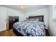 Cozy bedroom with floral bedding, dark wood furniture, and ample closet space at 3444 Clydesdale Dr, Holiday, FL 34691