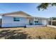 Charming single-story home with a well-manicured lawn, covered entry, and attached garage at 3444 Clydesdale Dr, Holiday, FL 34691