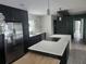 Modern kitchen with stainless steel appliances and island at 3606 River Grove Dr, Tampa, FL 33610