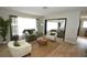 Open living room with light flooring and comfortable seating at 3606 River Grove Dr, Tampa, FL 33610
