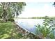 Serene waterfront property with lush vegetation at 3606 River Grove Dr, Tampa, FL 33610