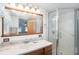 Bathroom with vanity, mirror, and shower stall at 3844 Kim Dr, Wesley Chapel, FL 33543