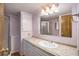 Bathroom with vanity, mirror, and shower stall at 3844 Kim Dr, Wesley Chapel, FL 33543