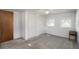Bedroom with closet space, carpeted floors, and natural light at 3844 Kim Dr, Wesley Chapel, FL 33543