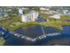 Elevated perspective of the property with docks, lush greenery, and water views at 4516 Seagull Dr # 805, New Port Richey, FL 34652