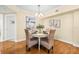 Dining area with a round table and stylish wicker chairs at 4516 Seagull Dr # 805, New Port Richey, FL 34652