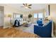 Inviting living room with comfortable seating, stylish decor, and sliding glass doors to the balcony at 4516 Seagull Dr # 805, New Port Richey, FL 34652