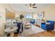 Bright and airy living room featuring plush furnishings, wood floors, and large windows at 4516 Seagull Dr # 805, New Port Richey, FL 34652