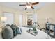 Relaxing main bedroom with stylish decor, soft linens, and access to an adjoining bathroom at 4516 Seagull Dr # 805, New Port Richey, FL 34652
