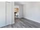Empty bedroom with gray wood-look floors and white walls at 4629 26Th S Ave, St Petersburg, FL 33711