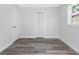 Simple bedroom with gray floors and white walls at 4629 26Th S Ave, St Petersburg, FL 33711