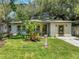 Charming updated home with lush landscaping and inviting front porch at 4629 26Th S Ave, St Petersburg, FL 33711