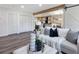 Living room features a comfy white couch and geometric rug at 4629 26Th S Ave, St Petersburg, FL 33711