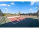 Fenced-in pickleball courts with windscreen at 4824 Boca Raton Ave, Sarasota, FL 34234