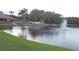 Scenic lake view of the community with fountain feature at 4846 Leyte Ct, New Port Richey, FL 34655