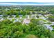 House nestled in a residential neighborhood at 6288 Airmont Dr, Spring Hill, FL 34606