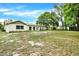 Large backyard with grassy area at 6288 Airmont Dr, Spring Hill, FL 34606