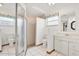 Clean bathroom with shower and double sinks at 6288 Airmont Dr, Spring Hill, FL 34606