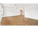 Bright living room featuring hardwood floors and lots of natural light at 6288 Airmont Dr, Spring Hill, FL 34606