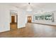Living room with hardwood floors and views of the backyard at 6288 Airmont Dr, Spring Hill, FL 34606