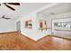 Bright living room with hardwood floors and sliding doors at 6288 Airmont Dr, Spring Hill, FL 34606