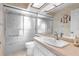 Bathroom featuring sliding glass shower doors, a vanity with sink, and tile flooring at 6409 Wedgewood Dr, Spring Hill, FL 34606