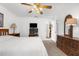 Bedroom featuring carpeted floors, a ceiling fan, and ample natural light at 6409 Wedgewood Dr, Spring Hill, FL 34606