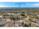 An aerial view of the home highlighting its location near Howard Park and Tampa Bay at 714 Charlotte Ave, Tarpon Springs, FL 34689