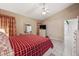 Spacious bedroom with large bed, dresser, and ensuite bathroom access at 714 Charlotte Ave, Tarpon Springs, FL 34689