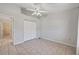 Empty bedroom with tile flooring and a ceiling fan at 714 Charlotte Ave, Tarpon Springs, FL 34689