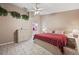 Spacious main bedroom with a king-size bed and attached bathroom at 714 Charlotte Ave, Tarpon Springs, FL 34689
