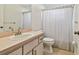 Bathroom with a neutral color palette, shower, and tile flooring at 7717 Foxbear Ct, New Port Richey, FL 34655