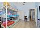 bedroom with bunk beds, a desk, and ample storage space at 7717 Foxbear Ct, New Port Richey, FL 34655