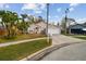 Quaint home with a two-car garage and landscaped yard at 7717 Foxbear Ct, New Port Richey, FL 34655
