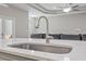 Kitchen island with a modern sink and faucet at 10451 Gypsy Ave, Weeki Wachee, FL 34613