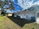 Large backyard with shed and spacious grassy area at 11556 Linden Dr, Spring Hill, FL 34608