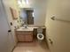 Full bathroom with toilet and sink vanity at 11556 Linden Dr, Spring Hill, FL 34608