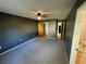 Spacious bedroom with carpeted floor and ceiling fan at 11556 Linden Dr, Spring Hill, FL 34608