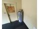 Garage with water heater and extra storage at 11556 Linden Dr, Spring Hill, FL 34608