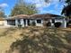 Front view of a ranch home with stone accents at 11556 Linden Dr, Spring Hill, FL 34608