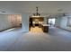Kitchen with breakfast bar and access to living room at 11556 Linden Dr, Spring Hill, FL 34608
