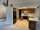 Kitchen features wood cabinets and an electric stove at 11556 Linden Dr, Spring Hill, FL 34608