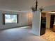 Bright living room with carpet flooring and large window at 11556 Linden Dr, Spring Hill, FL 34608