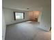 Spacious living room with carpeted floor at 11556 Linden Dr, Spring Hill, FL 34608