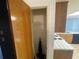 Walk-in pantry with shelving and vacuum cleaner at 11556 Linden Dr, Spring Hill, FL 34608