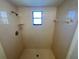 Clean shower stall with tiled walls at 11556 Linden Dr, Spring Hill, FL 34608