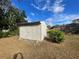 Detached storage shed in backyard, offering extra storage space at 11556 Linden Dr, Spring Hill, FL 34608