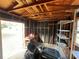 Workshop with shelving, workbench and riding mower at 11556 Linden Dr, Spring Hill, FL 34608