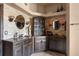 Elegant bathroom with double vanity and stone accents at 14101 Andrew Scott Rd, Spring Hill, FL 34609