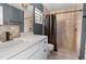 Clean bathroom with shower/tub combo and white vanity at 14101 Andrew Scott Rd, Spring Hill, FL 34609